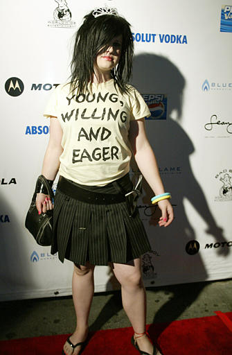 Singer Kelly Osbourne poses at a party hosted by...