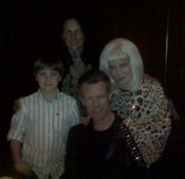 Country music singer Randy Travis and his wife...