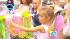 Caine's Arcade, Faery Hunt draw kids in :: A little girl reaches for a wand during A Faery Hunt, an outdoor show held in parks throughout Los Angeles.