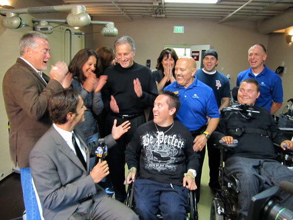 Hal Hargrave Jr., his family and foundation members react after hearing they would receive $7,000.