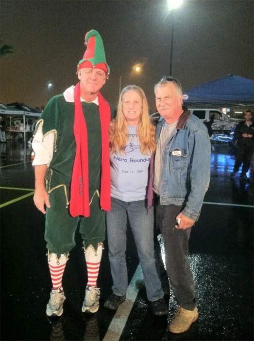 Garth the Elf poses for a photo at Spark of Love...