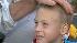 Boy brings football to help Stuff-A-Bus ::