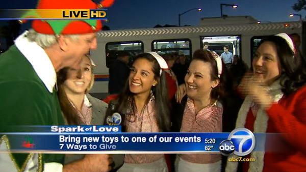 The Ruby's girls from Ruby's Diner in Orange brought toys to Friday's Stuff-A-Bus in Anaheim.