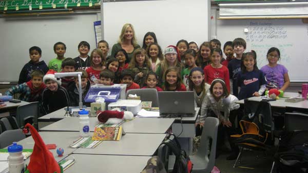 Mrs. Haitbrink's third grade class from Canyon Rim Elementary School helped Garth the Elf Stuff-A-Bus at the Honda Center in Anaheim on Friday, Dec. 16, 2011.