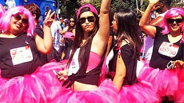 Walkers and runners dress up in tutus and...