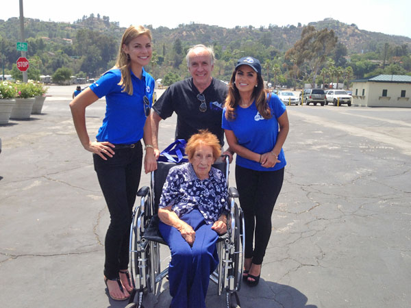 ABC7 Meteorologist Bri Winkler and Morning Traffic Reporter Alysha Del Valle pose with 97-year-old Juanita and another ABC7 viewer at a fundraising event at the Rose Bowl in Pasadena to help the victims of the Oklahoma tornado on Wednesday, May 22, 2013.