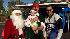 Residents help Garth the Elf Stuff-A-Bus in...