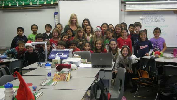 Mrs. Haitbrink's third grade class from Canyon Rim Elementary School helped Garth the Elf Stuff-A-Bus at the Honda Center in Anaheim on Friday, Dec. 16, 2011.