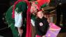 Garth the Elf poses with a guest at the Stuff-A-Bus toy drive at the Honda Center in Anaheim on Friday, Dec. 21, 2012.