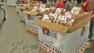 Boxes of food are shown at the Feed SoCal food drive at Vons in Costa Mesa on Friday, July 26, 2013.
