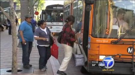 Commuters board a Los Angeles Metro bus in this undated file photo.
