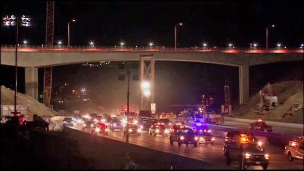 Cars are seen traveling through the Sepulveda Pass after the 405 Freeway reopened on Sunday, Sept. 30, 2012.