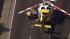 Rescuers get ready to load a man into an air...