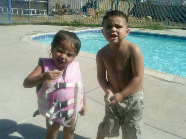Anaiia and her cousin Orlando stay cool by playing in the pool all day on Monday, Sept. 27, 2010.