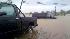Vehicles in parking lot nearly submerged