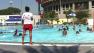 In the shadow of the Los Angeles Memorial Coliseum, elementary school students get a swimming lesson during an autumn heat wave on Tuesday, Oct. 10, 2012.
