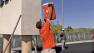 A worker takes a drink of water during a hot fall day that saw temperatures reach the triple digits in some parts of Southern California on Wednesday, Oct. 17, 2012.