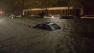 A vehicle is submerged on 14th Street near the Consolidated Edison power plant, Monday, Oct. 29, 2012, in New York.