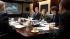 President Barack Obama receives an update from...