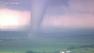 The massive tornado touches down and rips through the Oklahoma City suburb of Moore on Monday, May 20, 2013.
