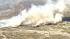 A fast-moving brush fire erupted in the Cajon...