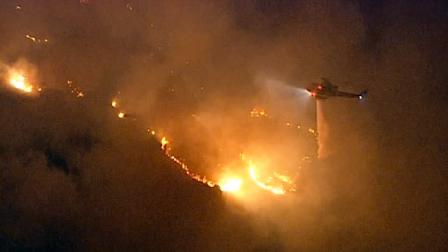 A brush fire kept firefighters busy in Rancho Palos Verdes on Monday, Jan. 9, 2012.