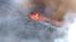 Flames consume brush along Interstate 5 in...