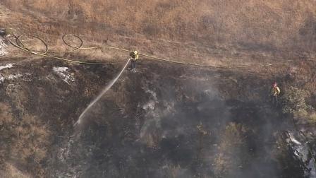 Fire crews make quick work of a small grass fire in Simi Valley on Tuesday, July 10, 2012.
