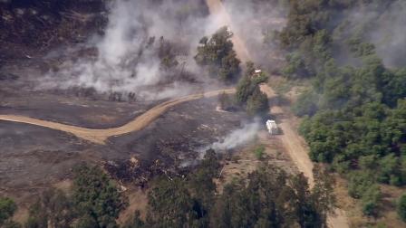 A grass fire erupted near Prado Regional Park in Chino on Wednesday, July 18, 2012.