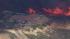 A brush fire threatened a residence in Murrieta...
