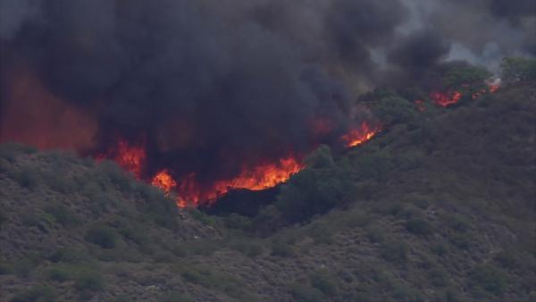 A brush fire burned in rural Murrieta on Wednesday, Aug. 1, 2012.