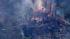 At least one home was engulfed by flames as fast-moving brush fire raged in the Murrieta area on Wednesday, August 1, 2012.
