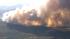 A large brush fire burns in Aguanga, just east...