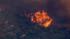 A large brush fire burns in Aguanga, just east...