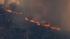 A large brush fire burns in Aguanga, just east...