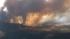 A large brush fire burns in Aguanga, just east...