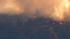 A large brush fire burns in Aguanga, just east...