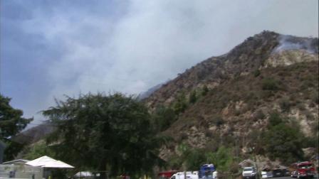 The Williams Fire burns on Wednesday, Sept. 5, 2012, near the Camp Williams Mobile Home Park.