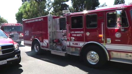 Fire engines are shown in the Brentwood area near the site of a brushfire that ignited on Saturday, Sept. 15, 2012.