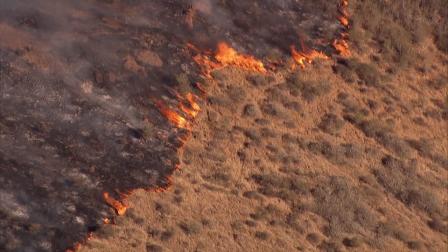 A brush fire broke out near the 101 Freeway in Camarillo Thursday, May 2, 2013.