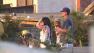Newbury Park residents look on as a wildfire burns near their homes on Thursday, May 2, 2013.