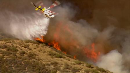 A brush fire erupted approximately 10 miles north of Castaic Lake next to the 5 Freeway Monday, May 13, 2013.