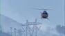 A helicopter flies over a wildfire burning in the Los Padres National Forest in Kern County on Thursday, May 16, 2013.