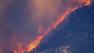 Flames are seen from the Powerhouse Fire burning in the Angeles National Forest on Sunday, June 2, 2013.