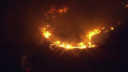 A brush fire broke out in the hills above Castiac Friday, June 28, 2013.