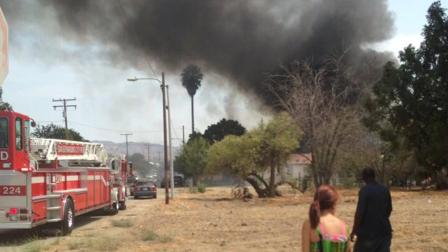 A brush fire is seen in San Bernardino in this photo sent by ABC7 viewer Tara Nichole via Twitter on Saturday, June 19, 2013.