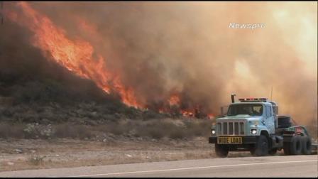 Firefighters were battling a 534-acre brush fire in San Bernardino County between Mentone and Yucaipa Saturday, June 29, 2013.