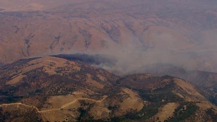 Firefighters were battling a fire near the southbound 5 Freeway and Fort Tejon in the Kern County town of Lebec on Friday, July 19, 2013.