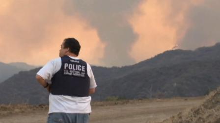 A wildfire burns near Camp Pendleton on Saturday, Oct. 5, 2013.