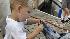 Evan Balloy, age 3, from Port Sulfur, La., looks...